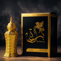 Gold perfume bottle and packaging with 'Burraq' branding on a dark background