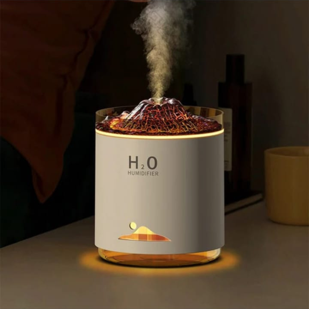 H2O humidifier emitting steam on a dark background