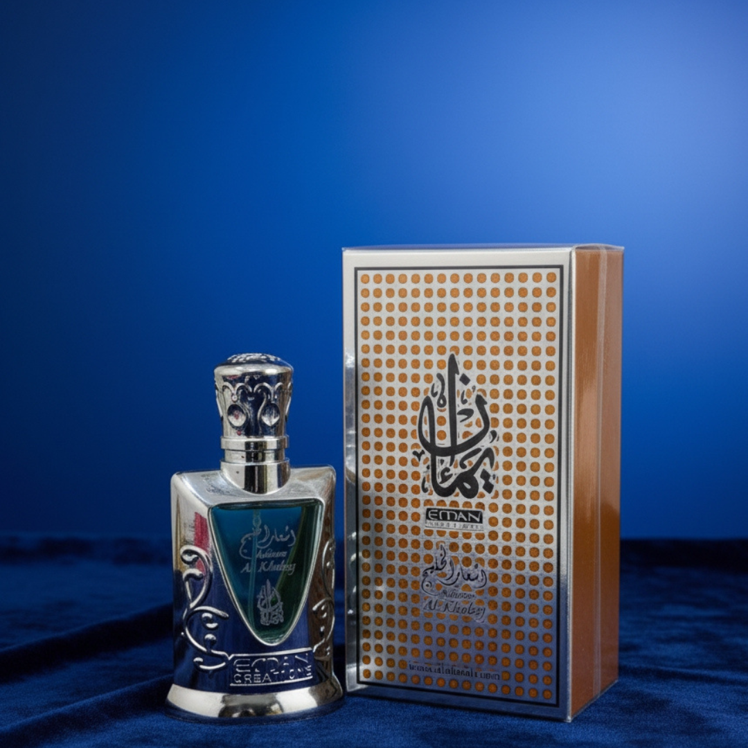 Perfume bottle and packaging on a blue background