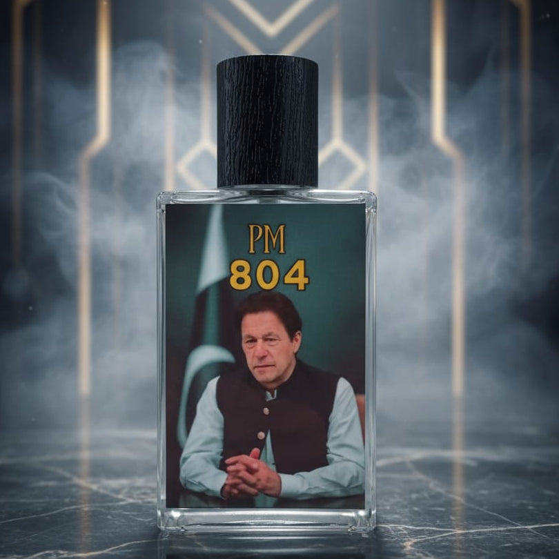 Perfume bottle labeled 'PM 804' with a portrait on a dark background