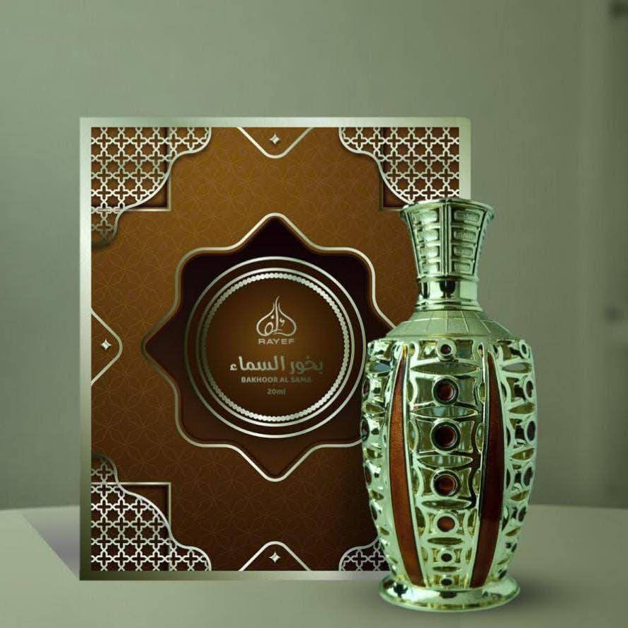 Decorative bottle with intricate design next to a matching brown box on a gray surface.